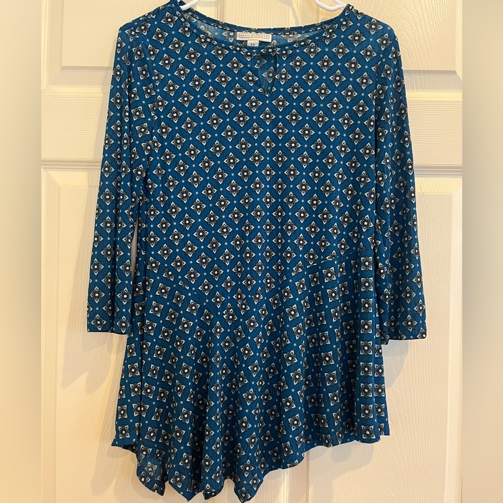 DANA BUCHMAN asymmetric top